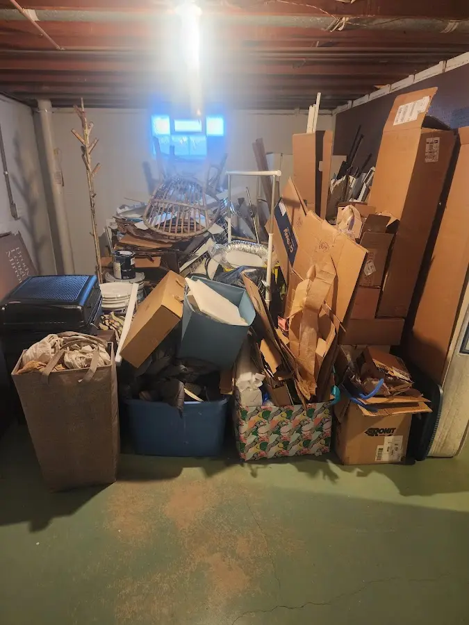 Roll-off dumpster container at job site for 15 Yard Dumpster Rental in Tuskegee